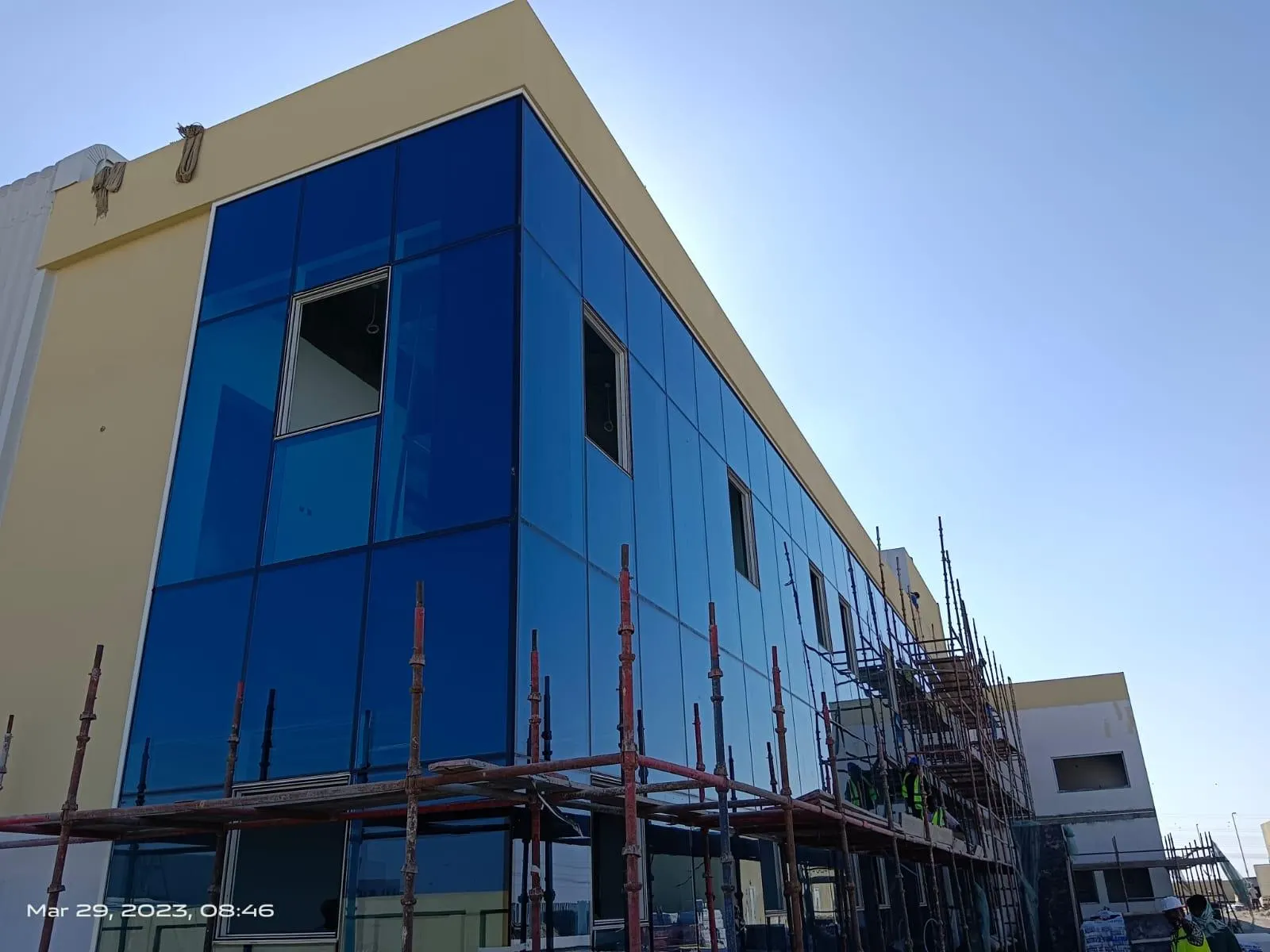 Blue glass curtain wall installed by Sky Light